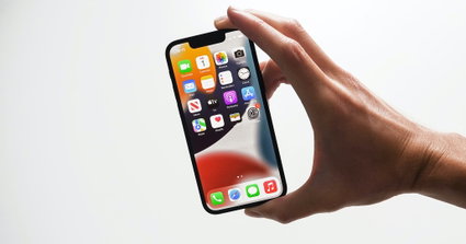 iPhone 13 in hand